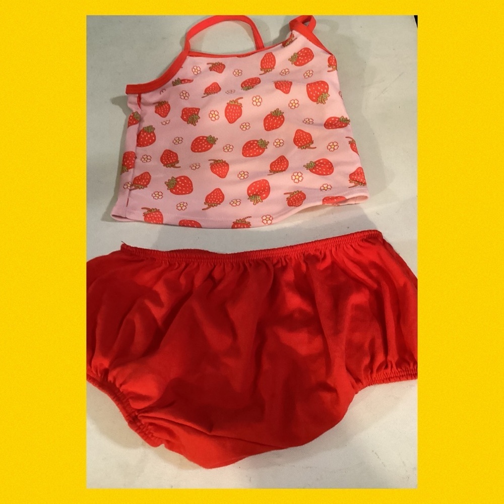 Strawberry design top with red bottoms, so cute little girl swimsuit.32